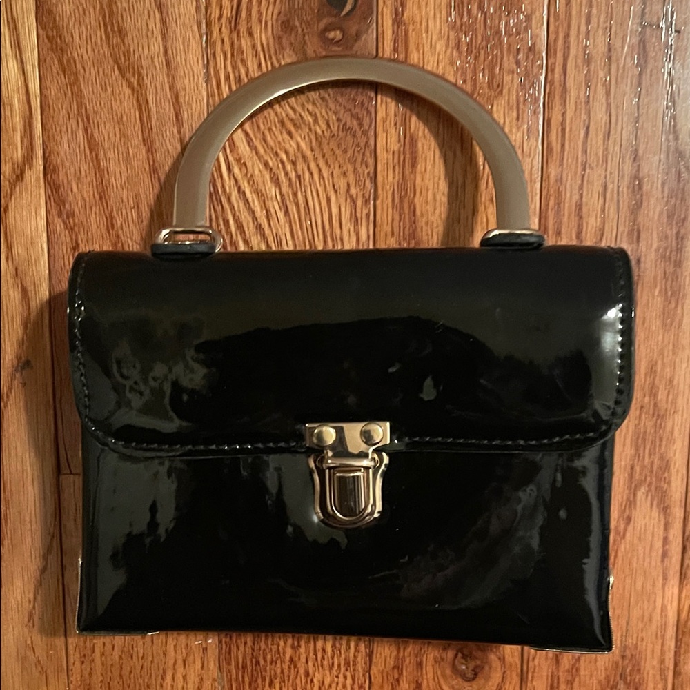 Olivia Miller Black and Gold Satchel